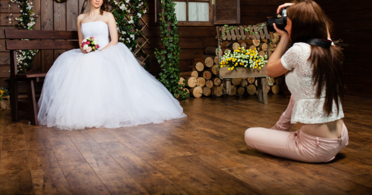 wedding photographer taking photos of bride