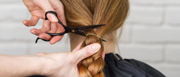 Woman getting extreme haircut