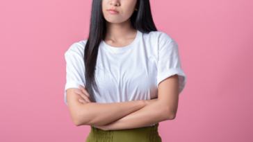 Upset woman with her arms crossed