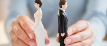 Wedding cake topper couple facing away from each other