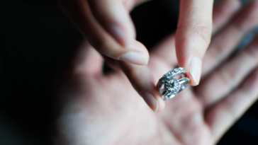 Woman returning engagement ring to man