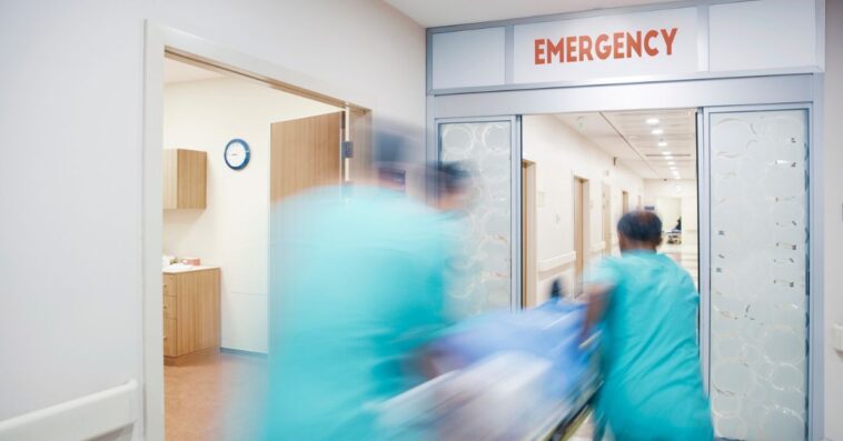 Medical team rushing patient to ER