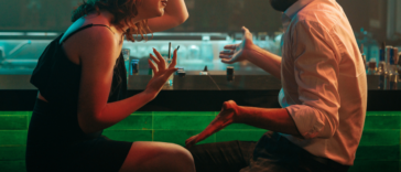 Couple arguing at a bar