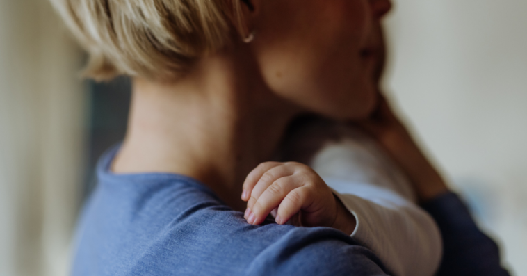 Mom holding her baby