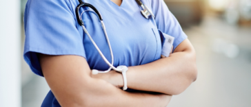 Angry nurse with arms crossed