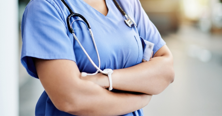 Angry nurse with arms crossed
