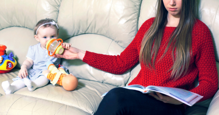 Disinterested teen babysitting