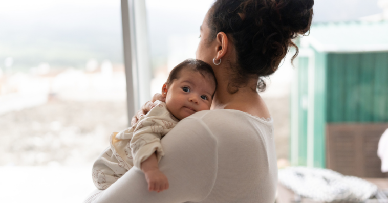 Woman holding a baby