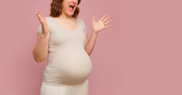 A pregnant woman screaming.