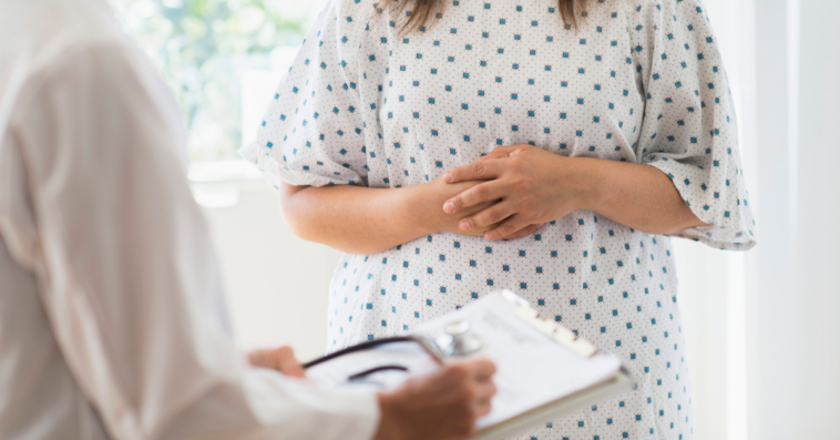 Woman wearing a hosptial gown