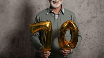 Man celebrating 70th birthday