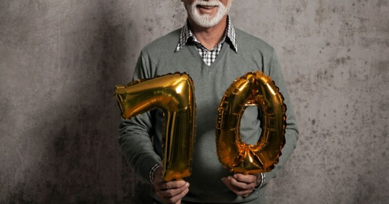 Man celebrating 70th birthday