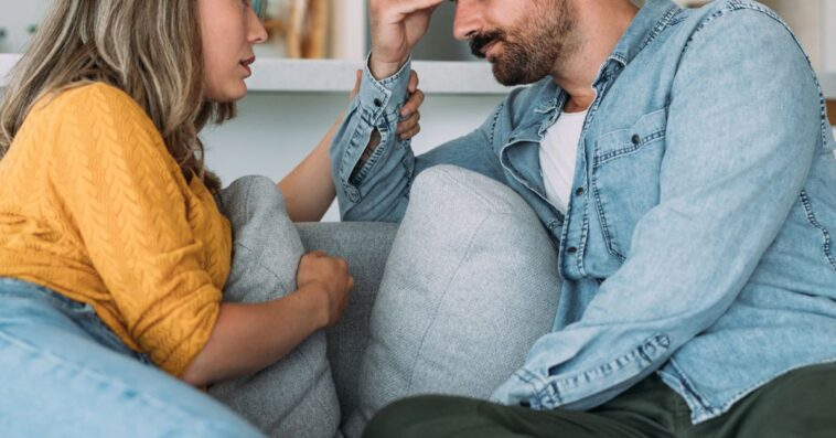 Couple engaged in serious conversation