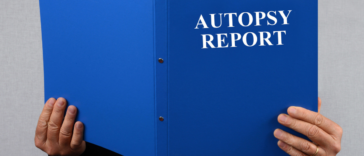 Person reading an autopsy report