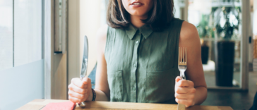 woman eagerly awaits food