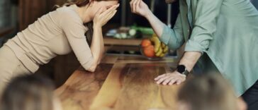 Young couple having an argument at home.