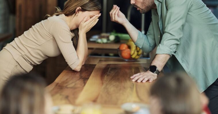 Young couple having an argument at home.