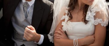 Newlywed couple arguing in car.