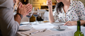 Couple arguing at dinner table