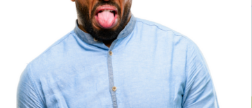 A man sticking his tongue out.