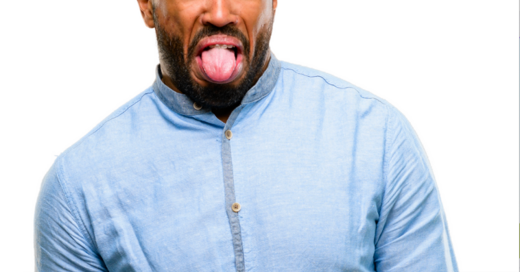 A man sticking his tongue out.