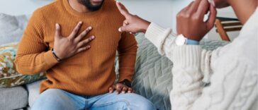 Shot of a young couple having an argument at home.