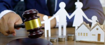 Family law concept. Cropped shot a man in a suit bringing a gavel down.