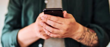 A man holding a cell phone.