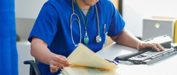 Junior doctor catching up on paperwork.