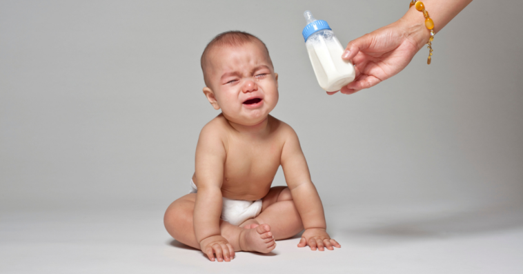 Baby crying about bottle