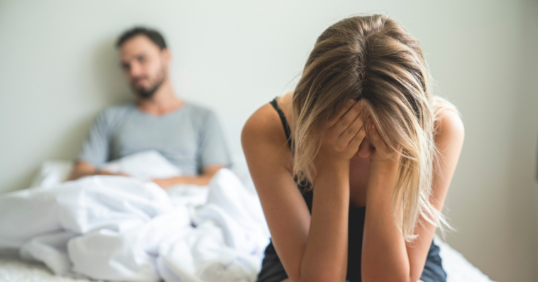 Couple arguing in bedroom