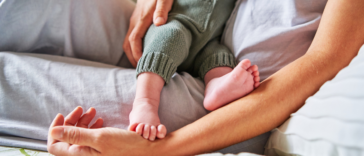 A woman breastfeeding a baby.