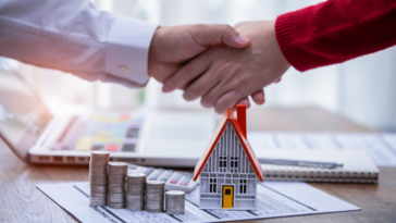 Two people negotiating a mortgage agreement