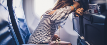 Upset woman on a plane