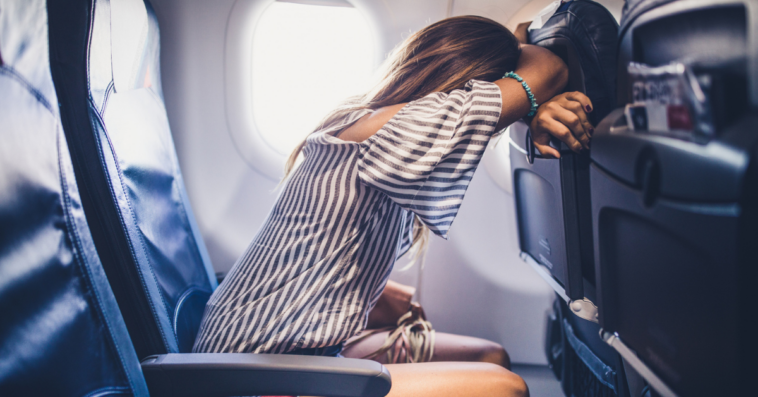 Upset woman on a plane