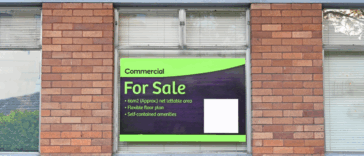 for sale sign on commercial property