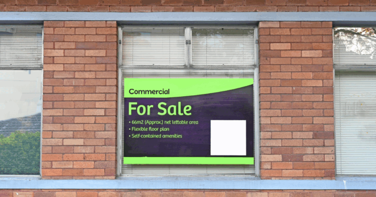 for sale sign on commercial property
