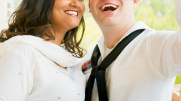 woman with man in U.S. Navy uniform