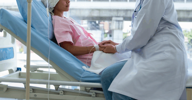 teenage girl in hospital bed with doctor