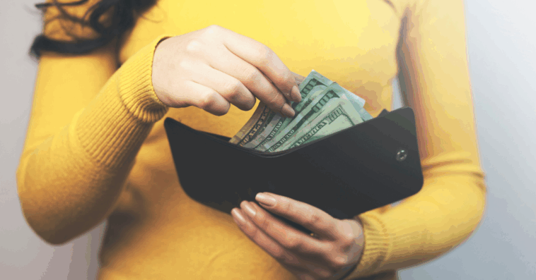 Woman holding wallet