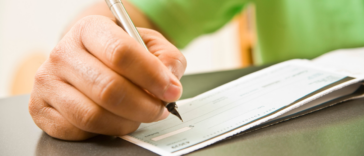 Man writing a check
