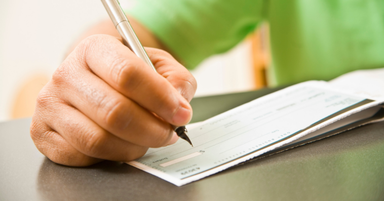 Man writing a check