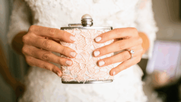 bride holding flask