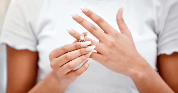 Woman removing her ring