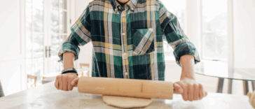 Young boy learning to bake