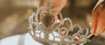 person holding tiara