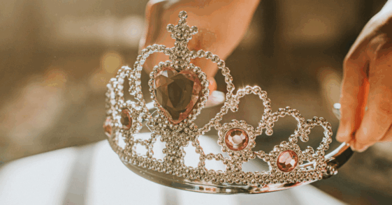 person holding tiara