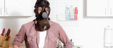 A woman wearing a gas mask.
