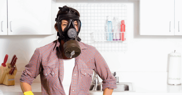 A woman wearing a gas mask.
