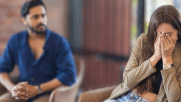 man speaking to upset woman